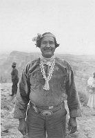PORTRAIT: HOPI MEN STANDING BY DESERT VIEW POINT DURING WATCHTOWER DEDICATION. 13 MAY 1933. FRED HARVEY CO. 