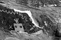&quotTHE TOP PETROGLYPHS GUARDING THE ENTRANCE TO PICTOGRAPH CAVE." REPRODUCED IN THE DESERT VIEW WATCHTOWER ON THE FIRST GALLERY PARAPET. GRCA 22605. CIRCA 1932. COLTER PHOTO.