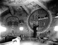 HOPI ARTIST FRED KABOTIE PAINTING THE SNAKE LEGEND PAINTING IN THE DESERT VIEW WATCHTOWER.GRCA 22671A CIRCA 1932. FRED HARVEY CO.