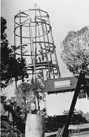 STEEL SKELETON OF DESERT VIEW WATCHTOWER FRAME. CONTRACTOR'S SHACK. BARREL. CIRCA 1932, HIRCHBORN