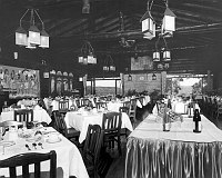 INTERIOR OF EL TOVAR DINING ROOM, VIEW N TO CANYON. MURALS. WINE PROMO DISPLAY. CIRCA 1967. FRED HARVEY PHOTO. 