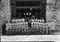GRAND CANYON LODGE CONCESSIONER PERSONNEL POSED IN FRONT OF NORTH RIM LODGE W/ SUP'T TILLOTSON & OTHERS. A TOTAL OF 54 PEOPLE. 20 JULY 1930. NPS PHOTO.<br>