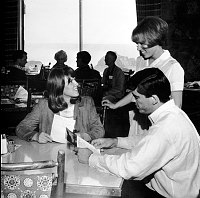 NORTH RIM GRAND CANYON LODGE INTERIOR OF DINING ROOM, GUESTS AND WAITRESS. CIRCA 1960. NPS, MANG.