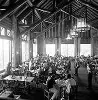 BREAKFAST BEING SERVED IN THE DINING ROOM OF GRAND CANYON LODGE, NORTH RIM. GUESTS AND WAITRESS. 20 JUNE 2000. NPS, QUINN.
