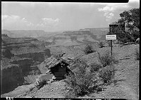 FOSSIL FERN EXHIBIT WITH JUNIPER BARK ROOF (FOSSIL PLANT QUARRY) ON CEDAR RIDGE NEAR SOUTH KAIBAB TRAIL. 13 SEPT 1937 NPS PHOTO