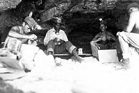 CCC WORK AT RAMPART CAVE: WILLIS EVANS AND WORKERS AT ENTRANCE TO CAVE. PHOTO BY MICHAEL BOBKO