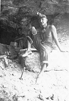CCC WORK AT RAMPART CAVE: MICHAEL BOBKO SUITED OUT AT ENTRANCE TO CAVE. PHOTO BY MICHAEL BOBKO