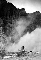 CCC RIVER TRAIL CONSTRUCTION. DUST CLOUDS  FROM BLASTING DURING CONSTRUCTION. 19 DEC 1935 NPS PHOTO. 