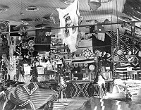 CLUTTERED CURIO SHOP IN THE ORIGINAL BRIGHT ANGEL HOTEL OWNED BY MARTIN BUGGELN. CIRCA 1910. 