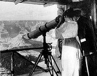 LOOKOUT STUDIO. &quotIN THE TELESCOPE TOWER&quot (CANYON IMAGE PASTED IN WINDOW)  COUPLE VIEWING CANYON. GRCA 50633 CIRCA 1915. FRED HARVEY CO