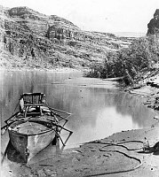 THE BOAT &quotEMMA DEAN&quot DURING THE SECOND POWELL EXPEDITION WITH JOHN WESLEY POWELL'S  ARMCHAIR AND LIFE PRESERVER.  AUGUST 1872.<br>
