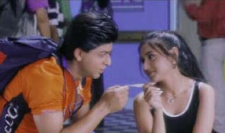 Rahul giving to Tina a friendship band