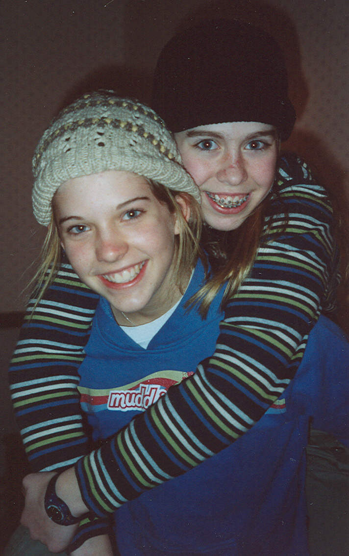 Heather and Julia piggy-back
