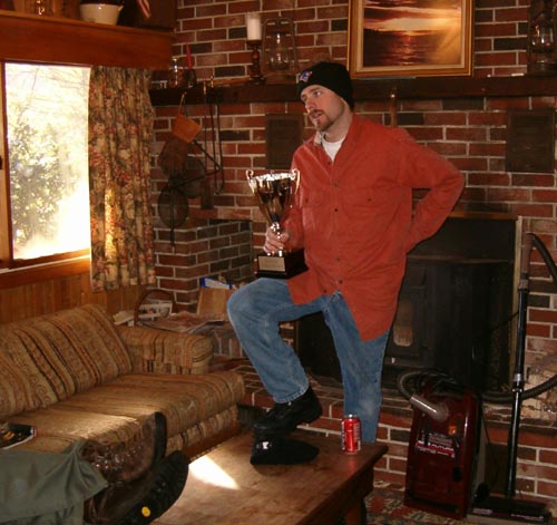 Chris prepares to hand Kevin the innaugural King of the Ice Cup