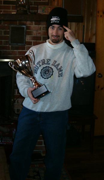 Kevin accepts his trophy...