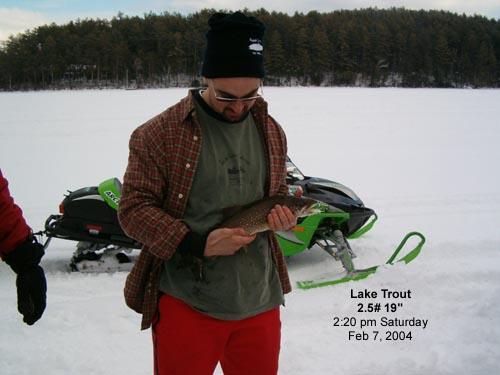 dude has no clue how to hold a fish...