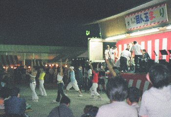 Young people dancing in the summer