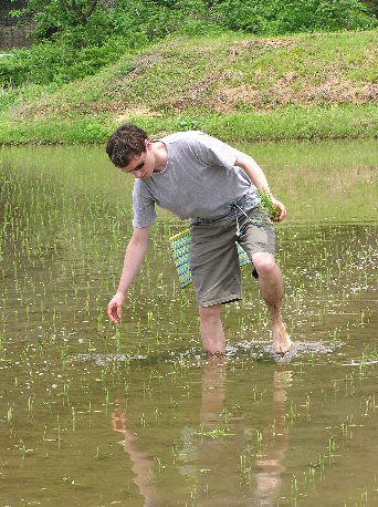 Tom struggles through the mud