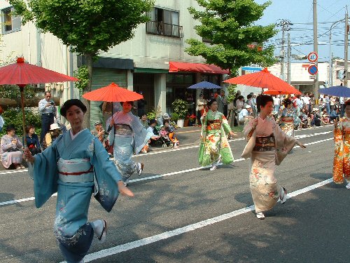 Ladies dancing in the street.