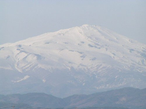 Mount Chokai in Spring. We get a lot of snow in the winter and patches stay on the north-facing slopes year round.