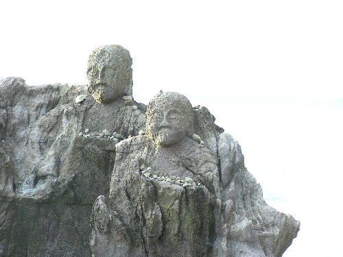 These are two of the "Juurokuraakan" at Fukura, an old fishing port at the foot of Chokai. In all there are about 25 carvings made in the late nineteenth century by a monk to protect men at sea.