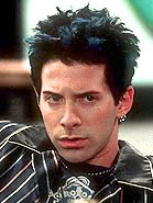 A screen shot of Scott Evil in Austin powers 2.&nbsp; In this scene is just about had enough of hearing about Mini-me.&nbsp; Plus he has funky blue hair.