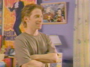 Seth in Tucker, in the background, it is Mekenna's bedroom, which features, Idle hands special edition postes, Austin Powers posters and most film posters from Seth's career.&nbsp; Though most cannot be seen in the image.