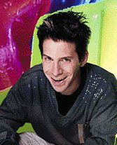 Seth with some weird green blow-up chairs.
