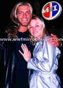 Edge with his wife