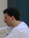 James Seal serves during the highly competitive doubles championship match