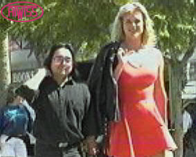 Man and Giantess walking in the street
