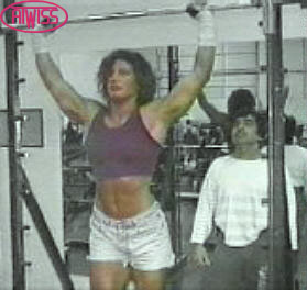 Carina doing workout and small man
