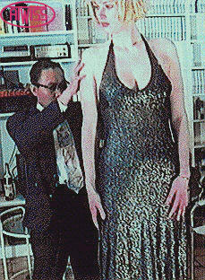 Very tall lady and asian man