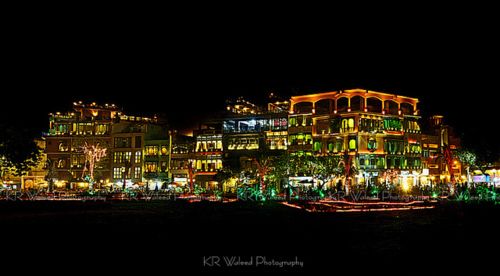It is located near the Roshnai Gate in the Walled City of Lahore, from where views of the Badshahi Mosque and the historic district of Lahore can be seen.: 