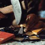 Hammering to fit a tessera