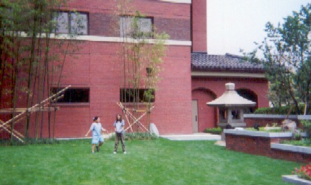 Two American kids playing outside Dragon Hill Inn.