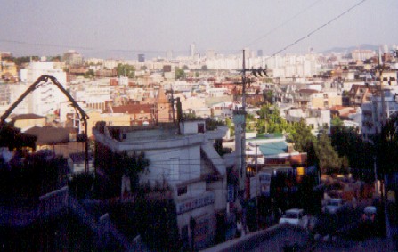 At the top of the stairs, with another climb before coming to Itaewon..