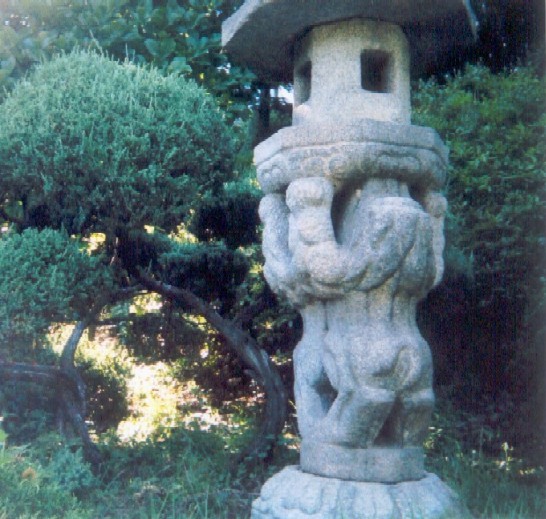 Stone lantern, halfway down the steps.