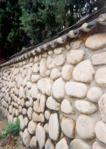 Outside the temple wall.
