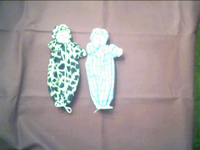 6-1/2" cloth thumbsuker doll, dressed in a flannel nighty..$6.00 ea.