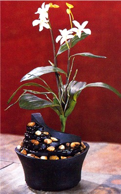 7 1/4" wide x 6 1/2" high&nbsp;&nbsp; comes with simulated water orchid