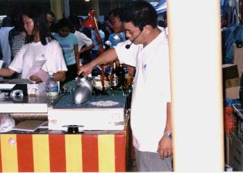 Salesman demonstrating the lastest gadgets @ Hong Kah Point!