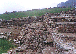 Looking along the colonnade of the Praetorium, with living rooms on the right hand side