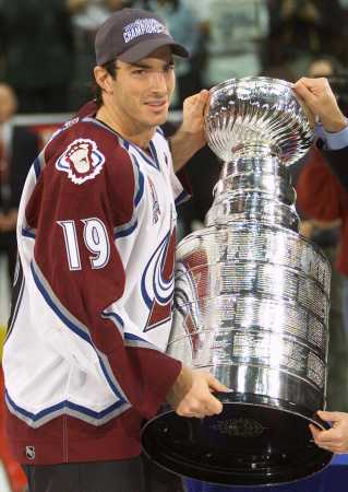 Captain Joe Sakic accepts the Stanley Cup.