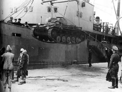 Rommel supervising the unloading of German light tanks.