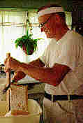 Photo of comb being cut from topbars