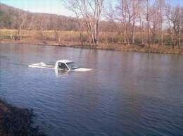 This truck decided to go for a swim...without permission