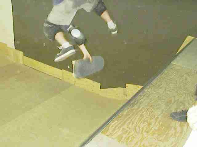 [Roger Blinoff, backside nollie heelflip @ rampage]