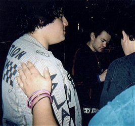 Deryck.. outside their tour bus.
