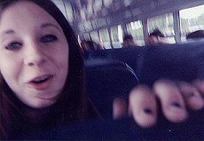 Er.  LOL.  Steven was going through my purse on the bus and pulled out my camera and took this picture.  Not sure what I'm doing.  But I look pretty damn amusing.